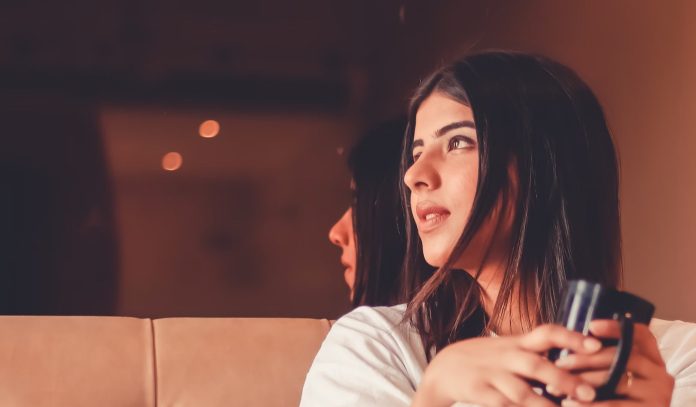 young Woman with coffee cup-pubdomain-Dollar Gill