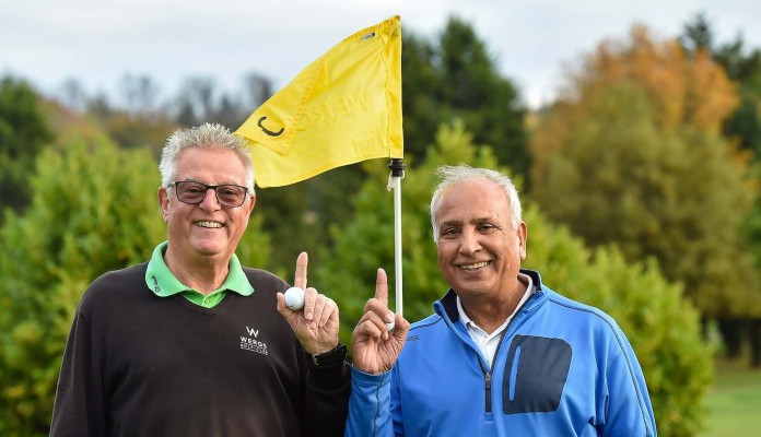 golfer-pals-wide w flag-SWNS