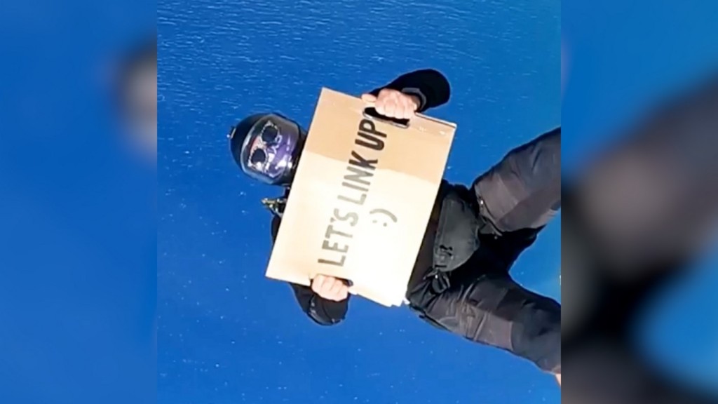 Man Lands Dream Job After Skydiving with Sign Asking for Work–New Employer Offers a Job the Same Way