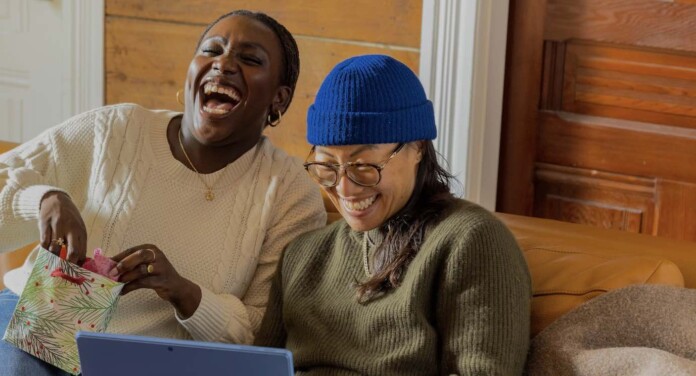 2 black girlfriends sisters laughing joy gift happy fun-pubdomain Surface