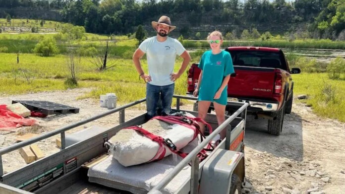 Lindsay and teacher Andrew with the fossil loaded up - ASMS
