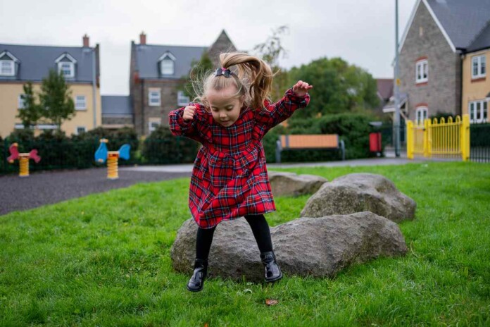 Piper-Kohl playing outside - SWNS