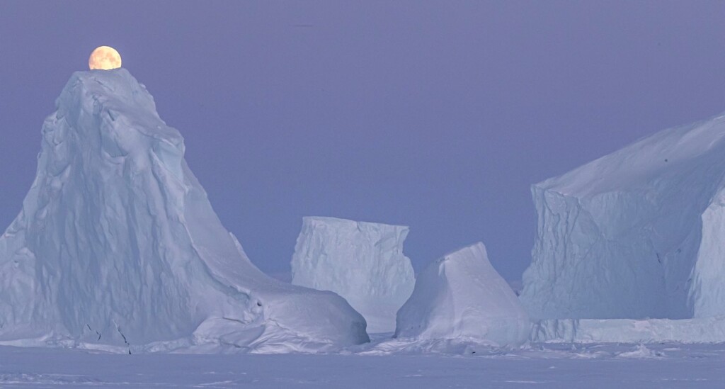 Paul Goldstein Photo Of Moon Over Ice in Nunavut Province Canada Swns