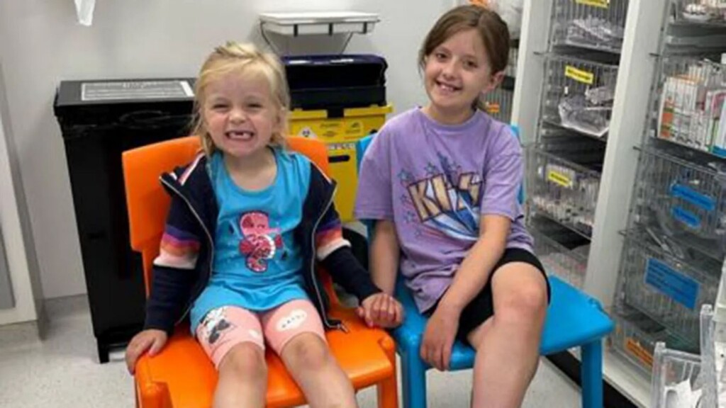 Sisters Mabel Leaning Left and Ruby Leaning Hold Hands in the Hospital. the Younger Sister Saved the Older One with a Bone Marrow Transplant. Amanda Fawcett Via Swns