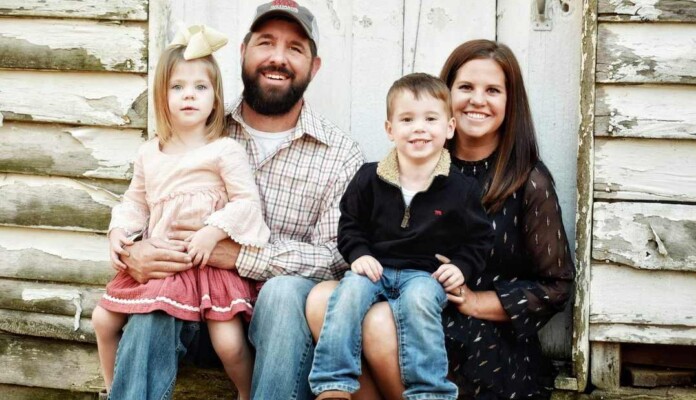 Brooke Smith-Sanders, and husband Walt Sanders with their twins Maverick and Shepherd - SWNS