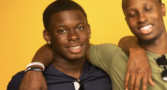 Black young man friends arm in arm brothers-pubdomain Kingsley Osei-Abrah
