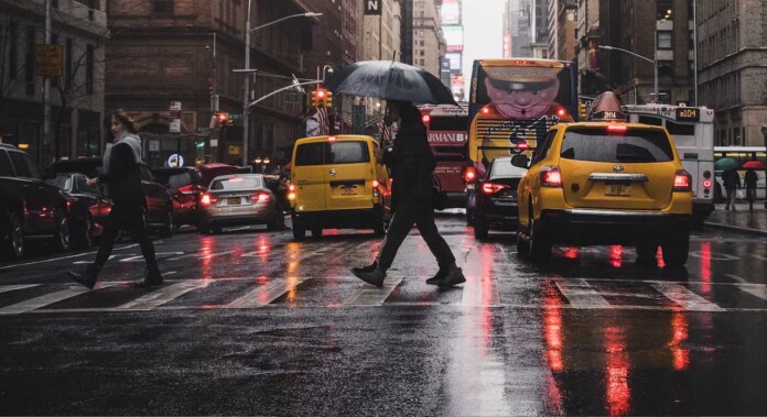 City street in New York City raining pedestrians-pubdomain Luke Stackpoole