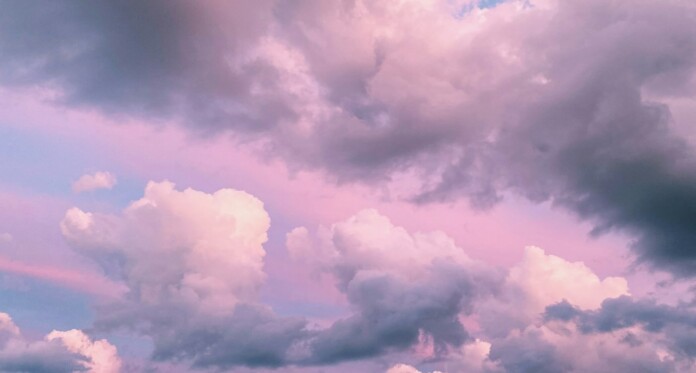 Pink clouds in sky by Yianni Mathioudakis For Unsplash+ X5_dGJBkmiU