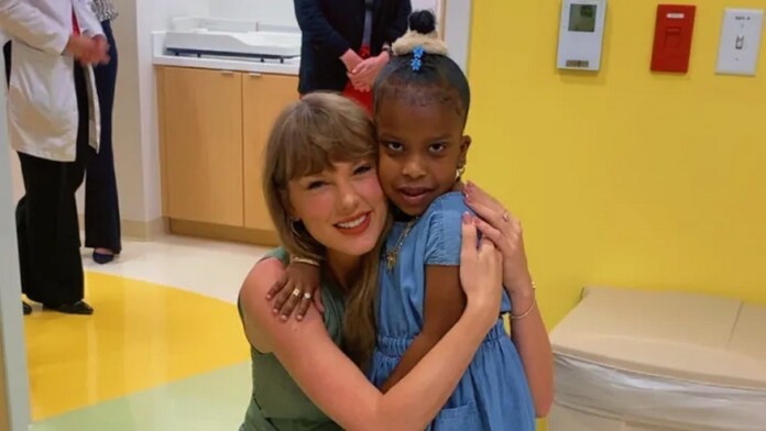 Majesty with her new friend Taylor Swift - credit Shaneka Holloman, via GoFundMe