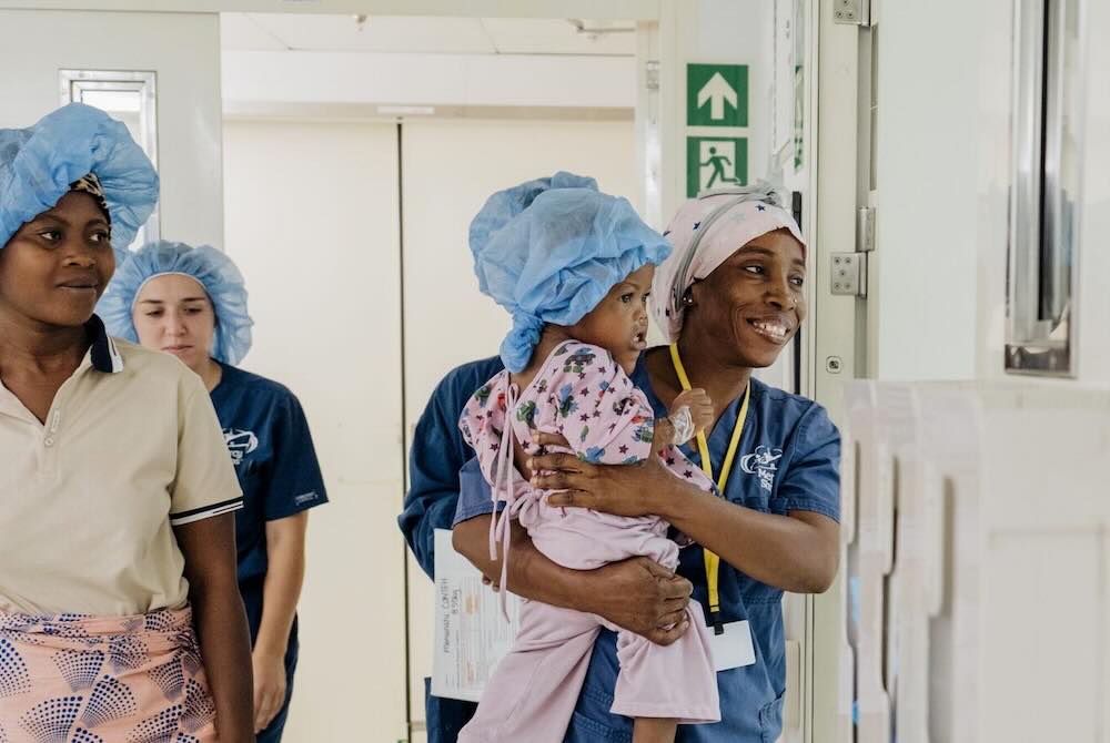 British Surgeon Saves Baby’s Life By Removing Tumor The Size Of Her Face – For Free