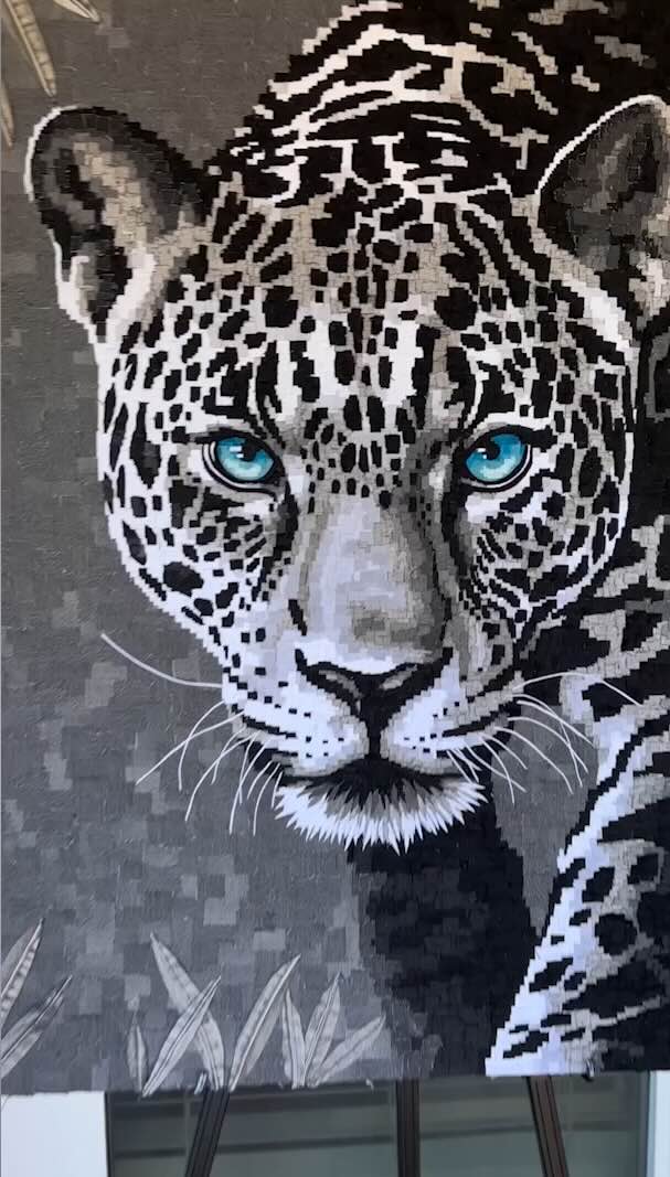 Artist Creates Striking Portraits Out Of Old Denim Jeans Cut Into Tiny Pieces (Watch)