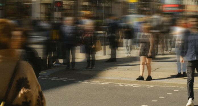 City street pedestrians strangers blurry crosswalk Natalia Blauth For Unsplash+ q374uGto2y4