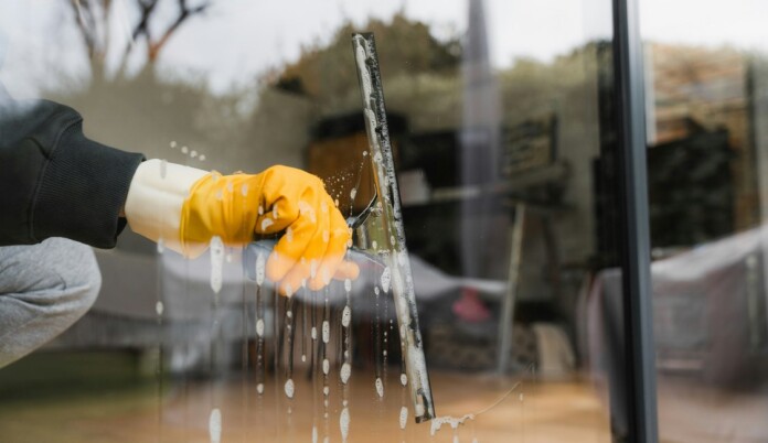 window washing - unsplash
