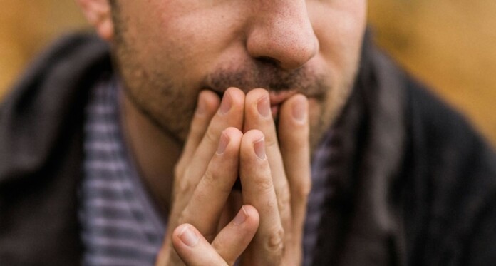 Man thinking worry future Nathan Dumlao OKCCCbyon28-unsplash
