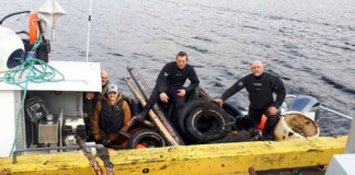 Wasteful Fisherman Turns into Underwater Garbage Man, Pulls Tons of Tires from Canadian Harbors