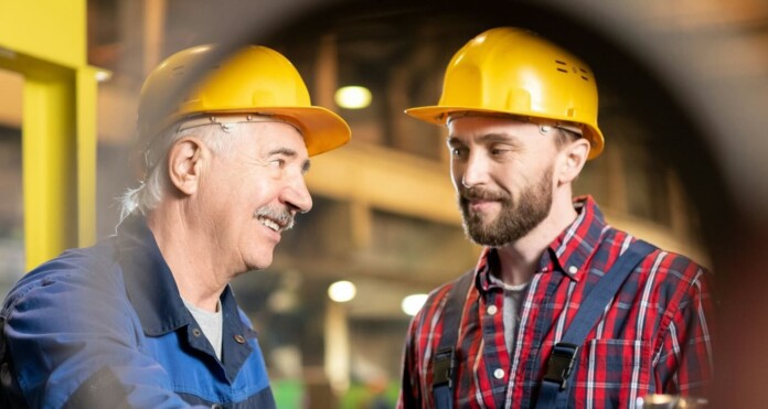 Factory union workers in hardhats Getty Images For Unsplash+ O7x9Jaz8LsA