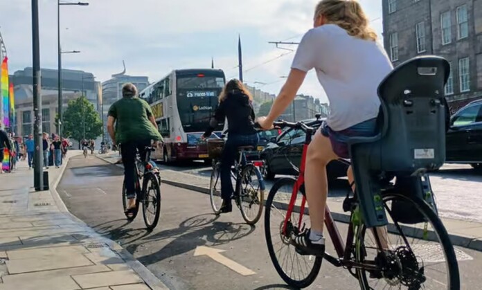 Cyclists on Leith Walk's segregated bike lane - credit, Cycling Scotland