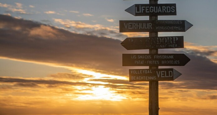 travel signs directions arrows by Astrid Schaffner qcIkeYYALT4-unsplash